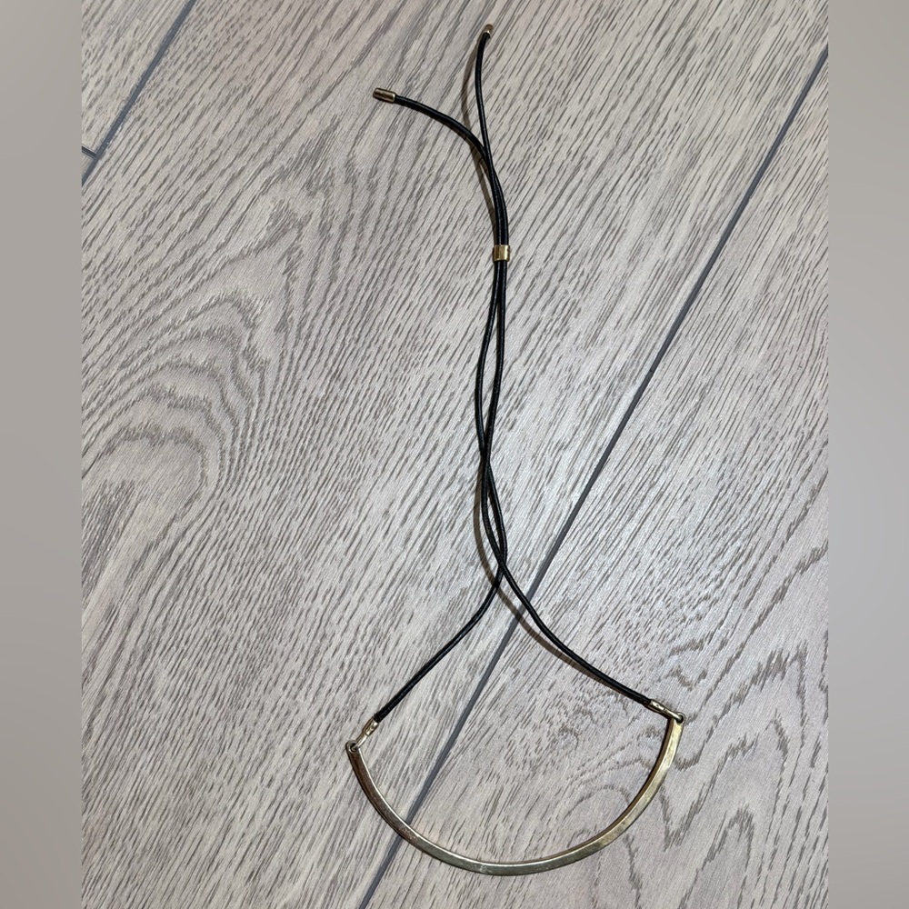 Elizabeth and James Gold Crescent Bar Necklace with Black Leather Cord